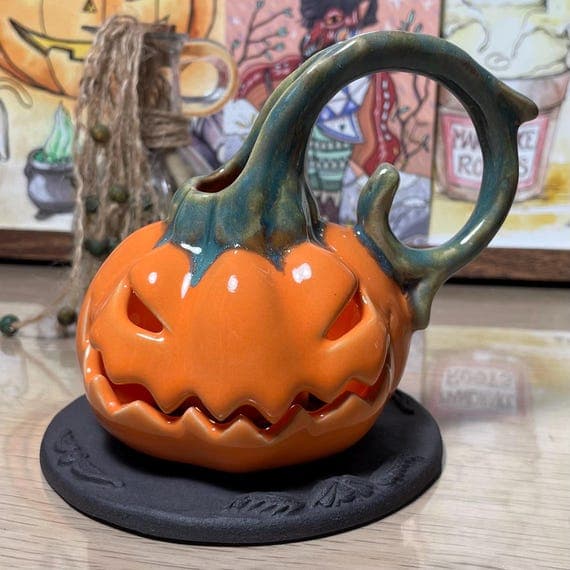 Pumpkin Candle Holder on Tombstone Base — Handmade Ceramic Halloween Decor, Tea-light Jack-o’-Lantern